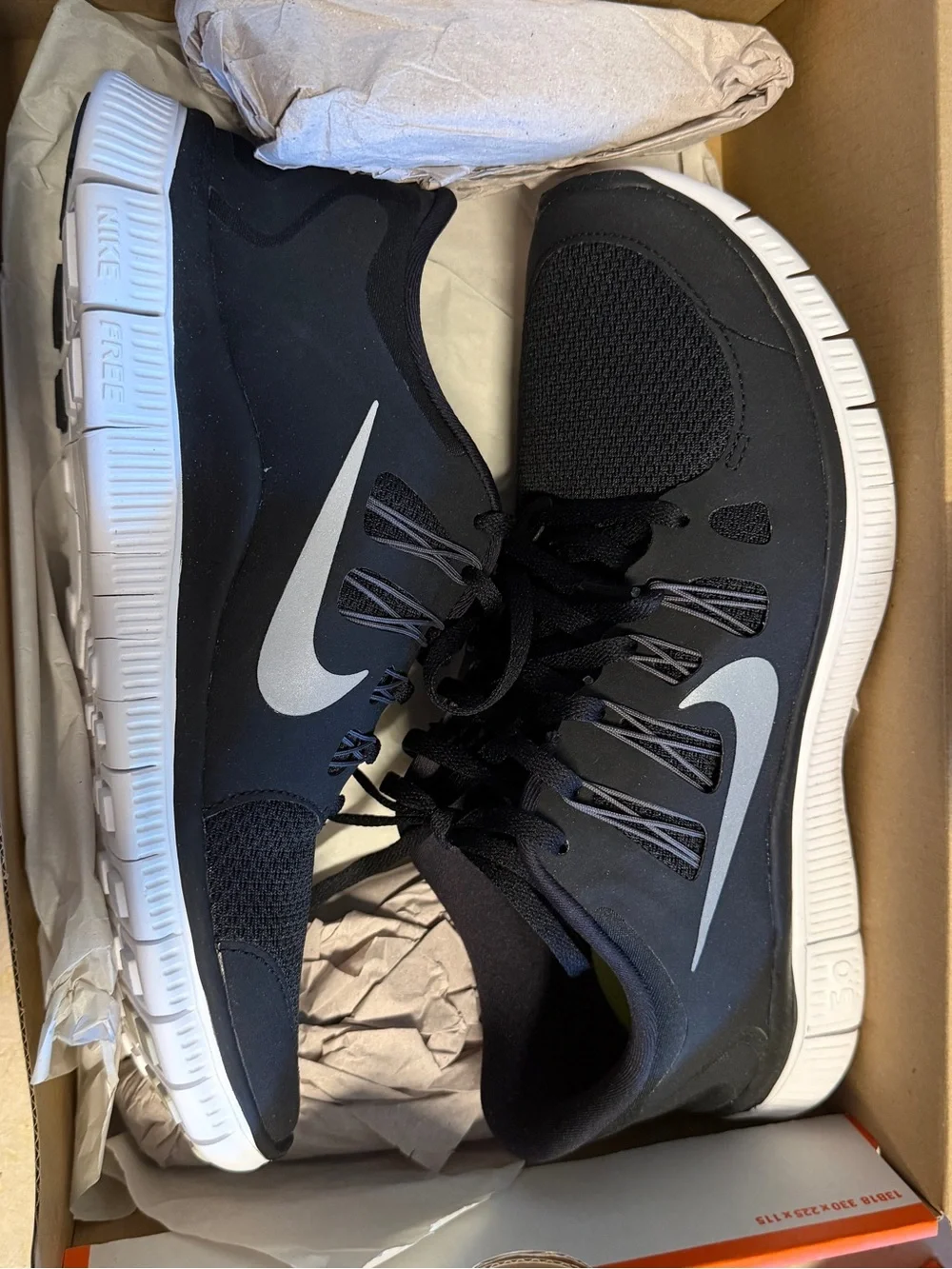 Nike Men’s Black Athletic Sneakers with White Swoosh